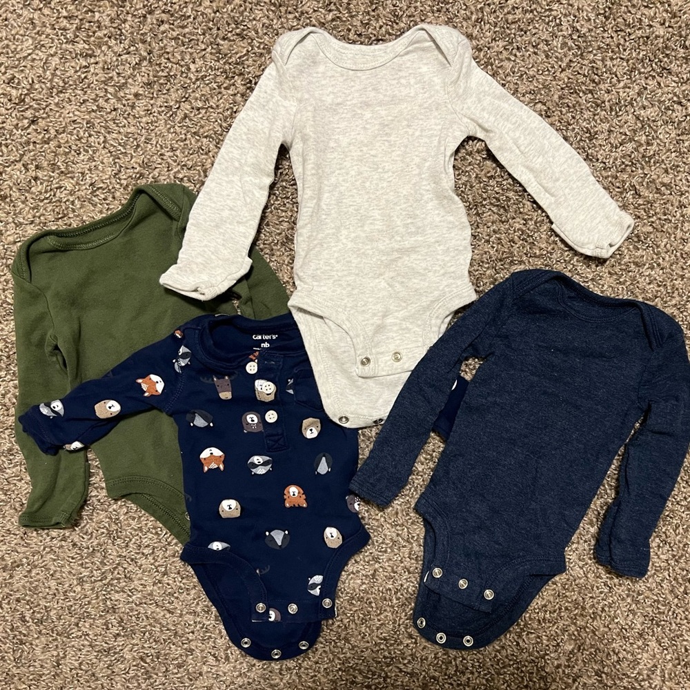 Set of 4 Carter’s newborn long sleeve onesies